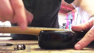 How to Fix a Loose Guitar Strap Button