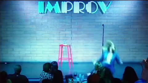 Watch fully-vaccinated comedian Heather McDonald collapsing on stage after mocking Jesus.