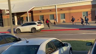 Mom Sings at Son as He Sprints into School