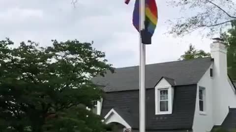 Neighborhood Celebrates Pride Month By Raising Rainbow Flag Along With U.S. Flag