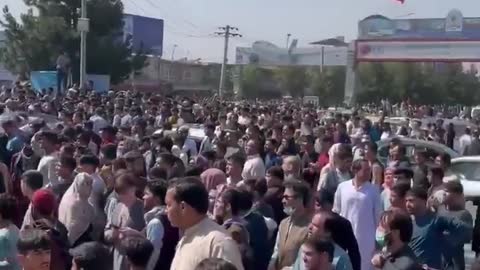 Thousands of people are trying to flee the Taliban arrive outside