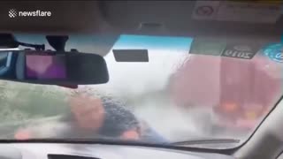 Chinese guy on car hood
