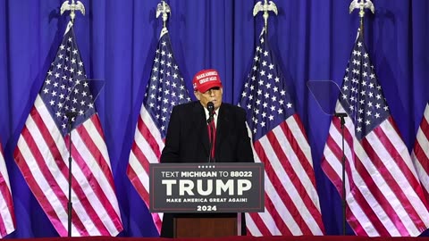 Former President Donald Trump talks about voters in Michigan during a rally in Waterford