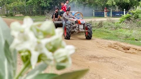 #79-driver tractor go transport water at the river