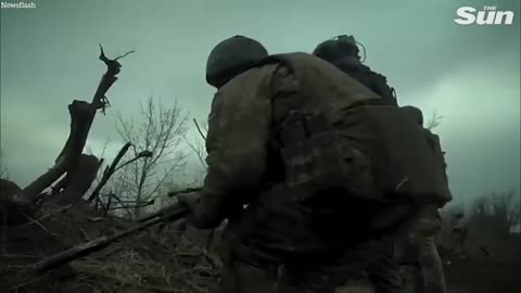 Ukrainian soldiers exchange fire with Russian fighters on the frontline