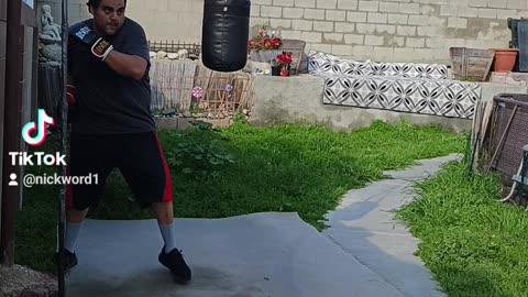 Prolast 15 Pound Punching Bag Workout Part 2. Practicing Hard Right Hooks!