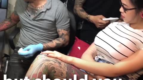 PRANK; Busty girl gets a Tattoo