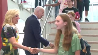 Biden repeatedly coughs into his hand — then goes right back to shaking hands...