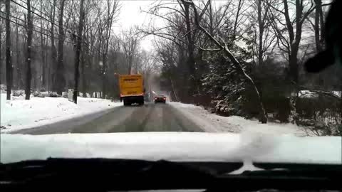 Truck crosses double yellow in the snow | Dash Cam Footage