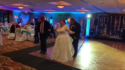 Comedian and top Trump impersonator surprises Wedding in Michigan Sat night