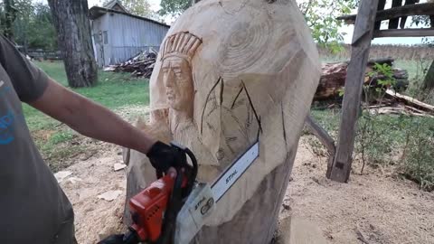 AMAZING CHAINSAW wood carving, Native American with wolves