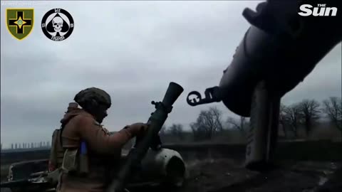 Ukrainian soldiers fire rocket-propelled grenades at Russian targets in Bakhmut