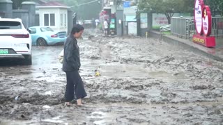 What’s caused China's record rainfall?