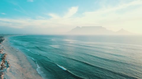 Sea Waves Kissing The Coastline