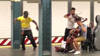 Man in yellow dances to classical music