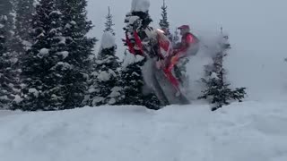 Snowmobile Jump Leads Directly Into Tree