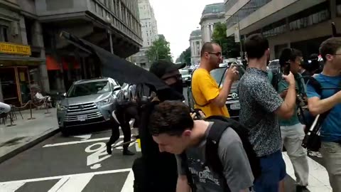 July 6 2019 DC 1.7 Antifa pulling newsstands into the street to block them