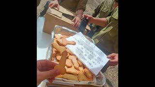 Volunteers from the Israeli LGBT community support IDF soldiers by baking them cookies like this