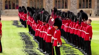 Britain's King Charles presents new colors to Irish Guards