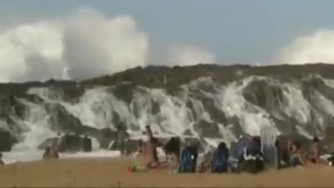 Tsunami invades Japan see the moment
