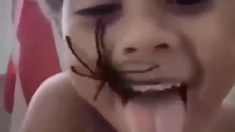 A spider comes out of a child's mouth