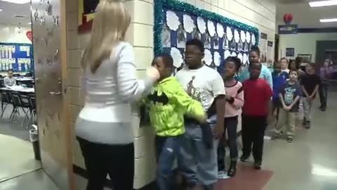 Teacher Has a Special Handshake for Each of Her 22 Students