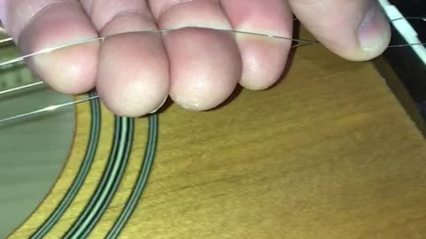 How To Stretch Brand New Guitar Strings - Guitar Maintenance and Repair