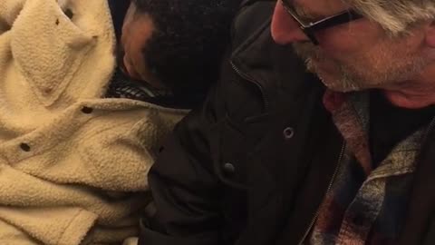 Stranger falls asleep on man's shoulder on bus ride