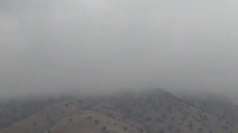 Mountain in Cloudy Foggy Weather