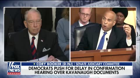 Cory Booker asks Grassley what's the rush?