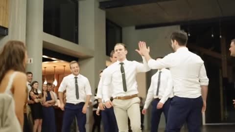 Groom Surprises Bride with Best Groomsmen Dance Ever