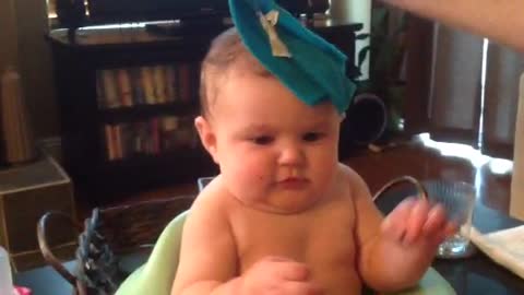 Baby's hilarious reaction to a wash cloth!