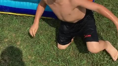 Collab copyright protection - front flip little boy water slide