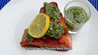 Salmon with chunky basil pesto.