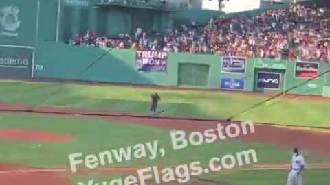 Someone dropped a massive “TRUMP WON” flag at Fenway field.