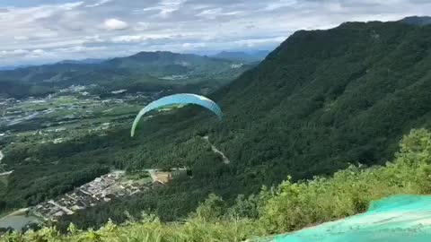a paragliding boy