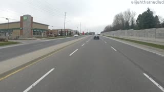 Motorcycle Rider Cleans up the Road While Riding