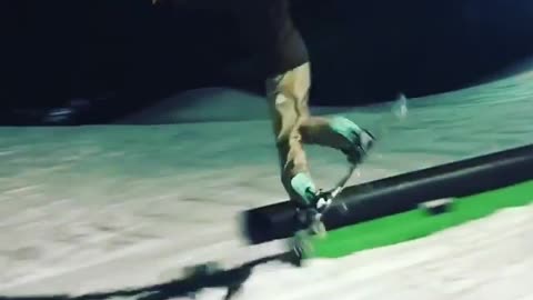 Black tube snowboard rail slide fail