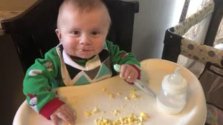 Cute baby eating baby leo