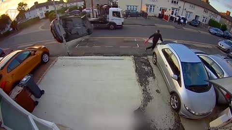 Car rolls several times almost hitting a pedestrian