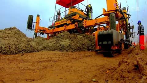 Incredible road construction machinery! A machine swept over and the road was paved