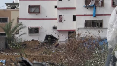 Scenes of targeting a Zionist force holed up inside a building in Jabalia al-Balad