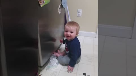Baby open fridge and get surprise