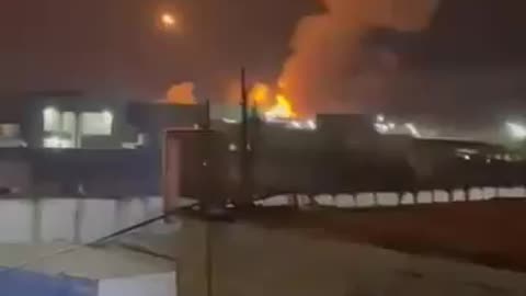 Multiple rockets/munition launching as secondaries from a targeted warehouse in Al-Qaim, Iraq