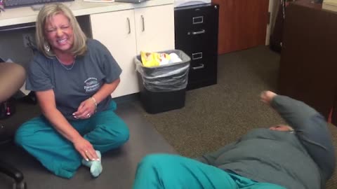 Two Nurses Tumble Down in Stretching Fail