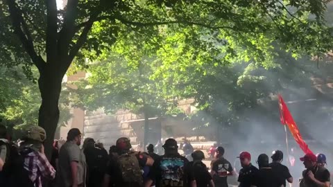 june 30 2018 Portland 1.3.2 Flashbangs from police who say march permit is revoked due to violence