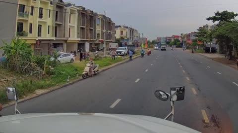 Child Rides into Middle of Busy Road