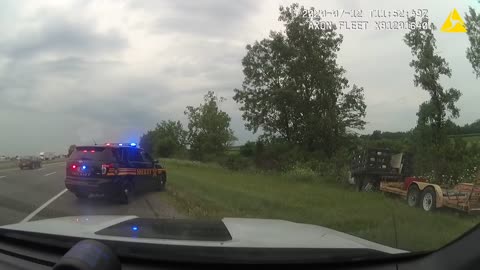 Stolen Work Truck And Trailer Takes Police Chase Off Road