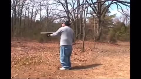 Fat guy shoots gun