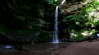 Our nieces fail at climbing a waterfall